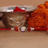 Dual Rudraksha With Color Change Om Stone  Bead Silver Rakhi